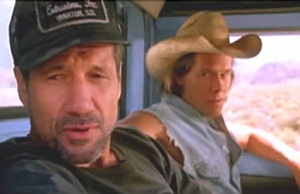 Yes, Kevin Bacon wears that hat for the whole movie.